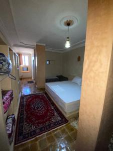 Ένα ή περισσότερα κρεβάτια σε δωμάτιο στο Auberge Soleil Bleu