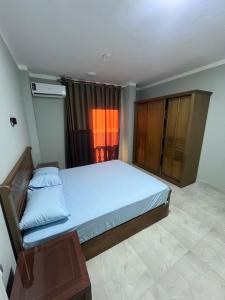 Ένα ή περισσότερα κρεβάτια σε δωμάτιο στο Gamandy Hostel