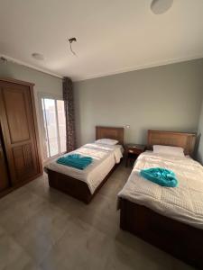 Ένα ή περισσότερα κρεβάτια σε δωμάτιο στο Gamandy Hostel