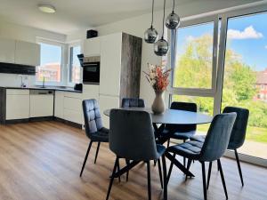 Η κουζίνα ή μικρή κουζίνα στο C Homes - Apartments & Lofts