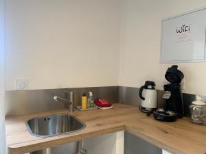 Η κουζίνα ή μικρή κουζίνα στο Chambre d'hôtes