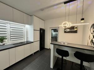 Kuchyň nebo kuchyňský kout v ubytování Vila Novara M21