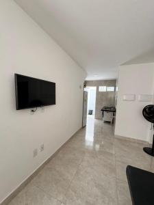 TV a/nebo společenská místnost v ubytování Apartamento Gramame, João Pessoa PB