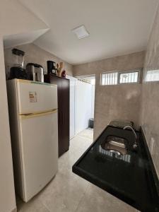Kuchyň nebo kuchyňský kout v ubytování Apartamento Gramame, João Pessoa PB + 2 fotografie