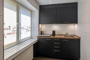 Η κουζίνα ή μικρή κουζίνα στο Hotel Allegro