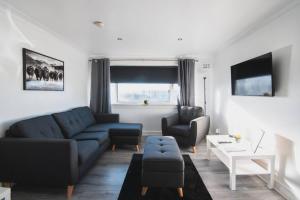 Et opholdsområde på Modern 3BR Flat with Parking