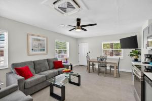 a living room with a couch and a table at Park Shores Suites Unit 9 in St Pete Beach