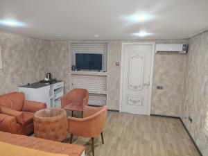 Μια τηλεόραση ή/και κέντρο ψυχαγωγίας στο Euro Hotel Quba