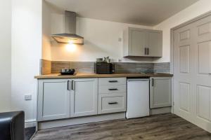 Køkken eller tekøkken på Comfortable Stay - Derby Road