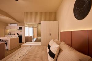 Giường trong phòng chung tại Casa Eucaliptos