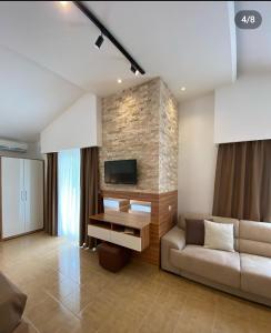 TV a/nebo společenská místnost v ubytování Hotel Resort Comfort