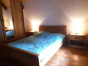 Postel nebo postele na pokoji v ubytování Grande maison pour familles et amis près des Gorges de l'Allier - FR-1-582-189