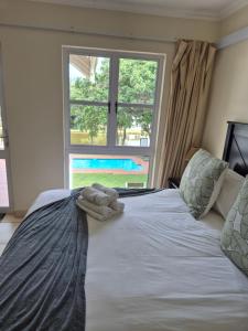 Voodi või voodid majutusasutuse Tortuga 22 - Caribbean Estates toas +24 fotot