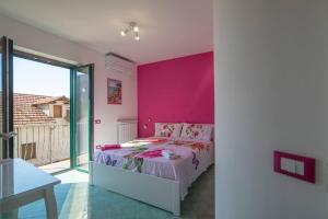 Ένα ή περισσότερα κρεβάτια σε δωμάτιο στο Coast 2 Coast