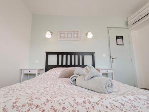 Postel nebo postele na pokoji v ubytování Maxime - FR-1-591-698