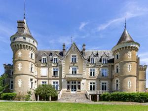 an old castle with two towers at Suite Familiale au Château avec Balcon sur Parc - FR-1-591-767 in Cluis