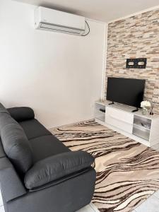 Μια τηλεόραση ή/και κέντρο ψυχαγωγίας στο Le Confort Double