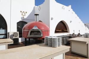 Εγκαταστάσεις μπάρμπεκιου για όλους τους επισκέπτες του ξενοδοχείου διαμερισμάτων