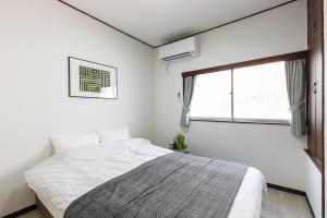 Voodi või voodid majutusasutuse Tsutsuicho STAY - Vacation STAY 90930v toas