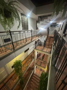 an overhead view of a building with stairs and plants at Rodadero Parador, apartamentos a 20 metros de la playa in Santa Marta +119 photos