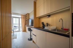 Η κουζίνα ή μικρή κουζίνα στο AR AMAN suite