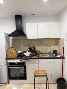 Kuchyň nebo kuchyňský kout v ubytování Le Prestige - T2 Neuf et Equipé