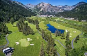 an aerial view of a golf course in the mountains at 6th Floor Fireplace Suite in Tahoe City