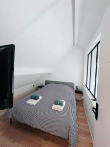 Postel nebo postele na pokoji v ubytování La dunette