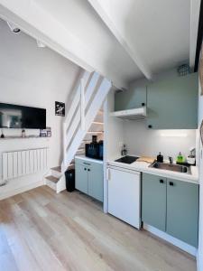 Kuchyň nebo kuchyňský kout v ubytování La dunette