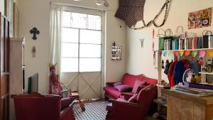 Posezení v ubytování El Diablo y la Sandia B&B