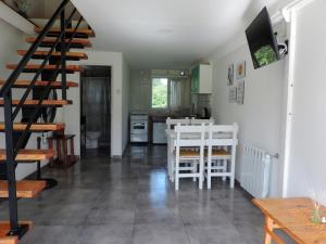 TV a/nebo společenská místnost v ubytování Río Epuyén Aparts