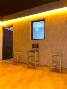 TV a/nebo společenská místnost v ubytování Sunset House