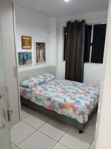 Postel nebo postele na pokoji v ubytování Flat Bela Amarração + 1 fotografie