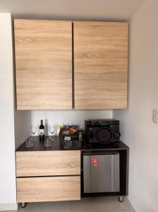 Η κουζίνα ή μικρή κουζίνα στο HOTEL RIVERA CENTRAL