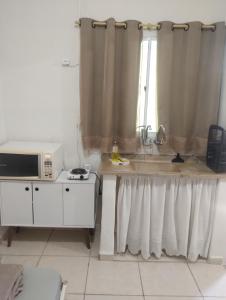 Kuchyň nebo kuchyňský kout v ubytování Edícula em São Pedro