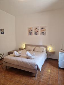 Ένα ή περισσότερα κρεβάτια σε δωμάτιο στο Daisy, cozy apartment in como