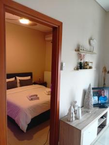 Postel nebo postele na pokoji v ubytování View clock loft