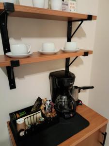 Příslušenství pro přípravu čaje a kávy v ubytování View clock loft