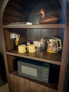 Kuchyň nebo kuchyňský kout v ubytování Woodland Parkview Motel