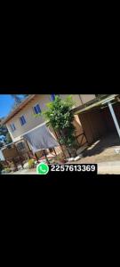 a picture of a house with a frisbee in front of it at Es Lo Que Hay in Nueva Atlantis