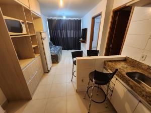 Una cocina o cocineta en Cittá Residence 3 academia piscina