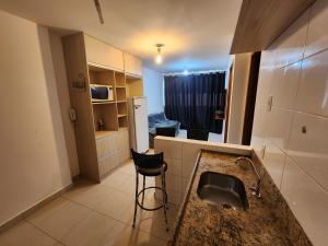 Una cocina o cocineta en Cittá Residence 3 academia piscina