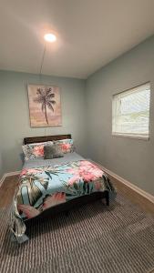 Ένα ή περισσότερα κρεβάτια σε δωμάτιο στο Penguins on the Beach Resorts