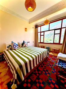 Ένα ή περισσότερα κρεβάτια σε δωμάτιο στο Atlas Walnut Hotel