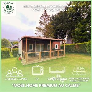 a model of a modular home on a lawn at Houlgate - 279 - Magnifique Mobilhome 6 personnes sur Camping 5 étoiles in Houlgate
