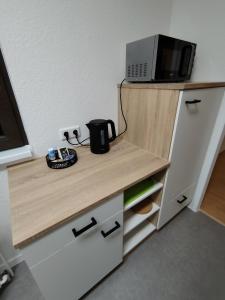 Η κουζίνα ή μικρή κουζίνα στο Waldblick Suite 100 qm