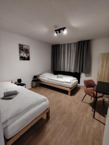 Ένα ή περισσότερα κρεβάτια σε δωμάτιο στο Waldblick Suite 100 qm