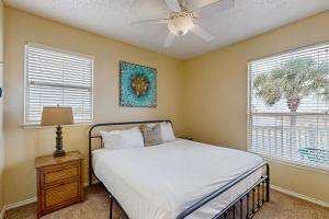 Ένα ή περισσότερα κρεβάτια σε δωμάτιο στο Beach Club 276