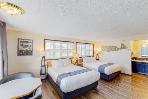 Ένα ή περισσότερα κρεβάτια σε δωμάτιο στο Lamplighter Inn - 117 Whale Watching