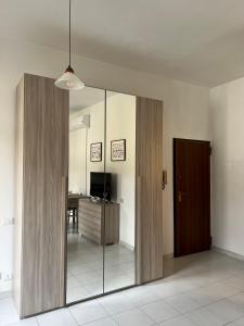 Μια τηλεόραση ή/και κέντρο ψυχαγωγίας στο Appartamento Le Maioliche +13 φωτογραφίες